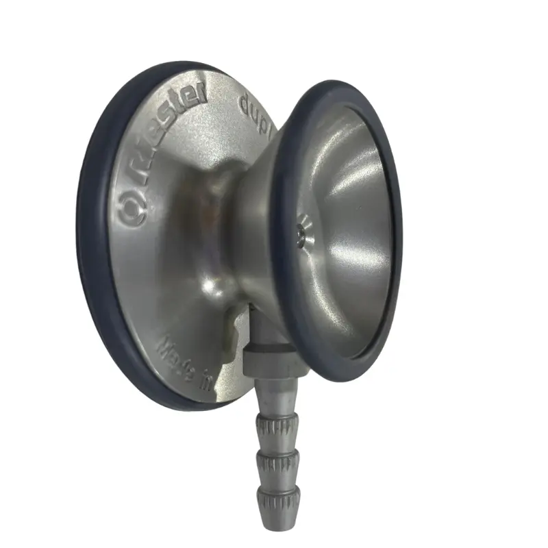 Campana metálica y membrana de un estetoscopio Riester Duplex con tubo de conexión y borde gris.