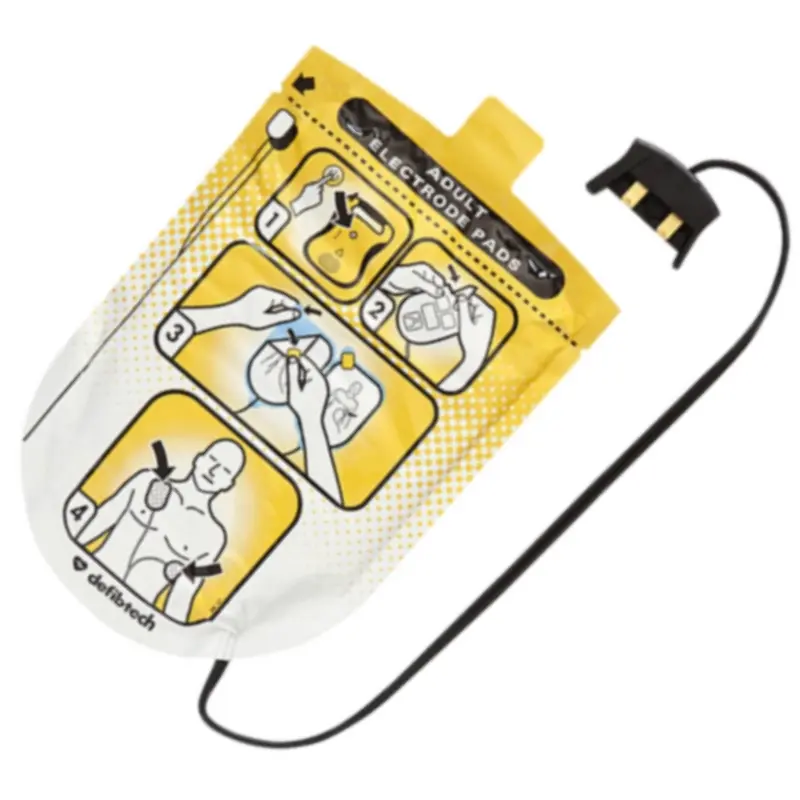 Envase sellado de los electrodos de adulto Defibtech Lifeline junto a su cable negro y conector enchufable.