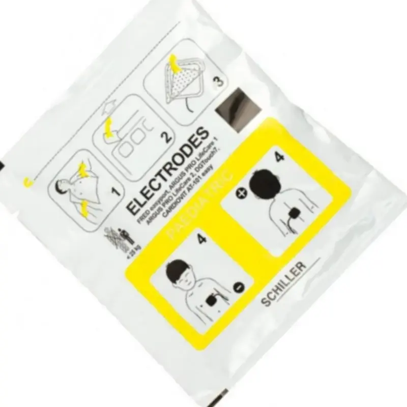 Envase sellado de electrodos pediátricos Schiller Fred Easyport con instrucciones impresas de colocación.