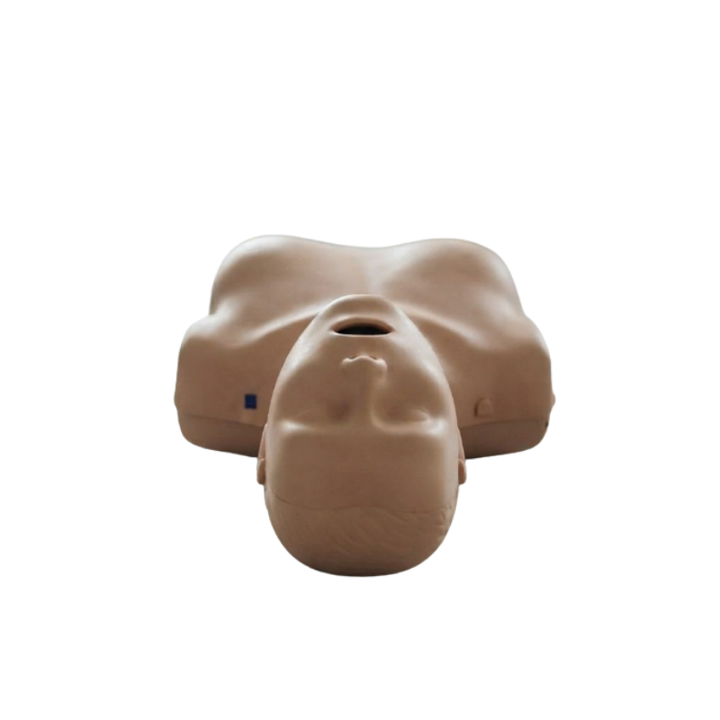 Torso superior de un maniquí de RCP femenino Prestan Professional de piel clara con la cabeza reclinada visto desde arriba.