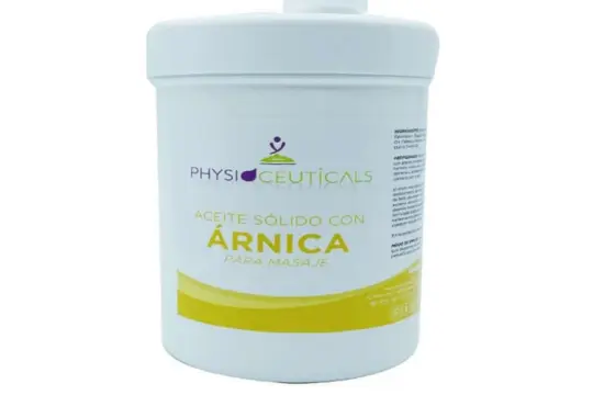 Tarro blanco de aceite sólido con árnica para masaje de Physioceuticals con etiqueta corporativa en tonos verdes y amarillos.