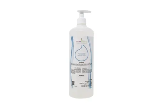 Botella dosificadora cilíndrica de gran formato de aceite neutro para masaje con etiqueta azul y blanca sobre fondo blanco.